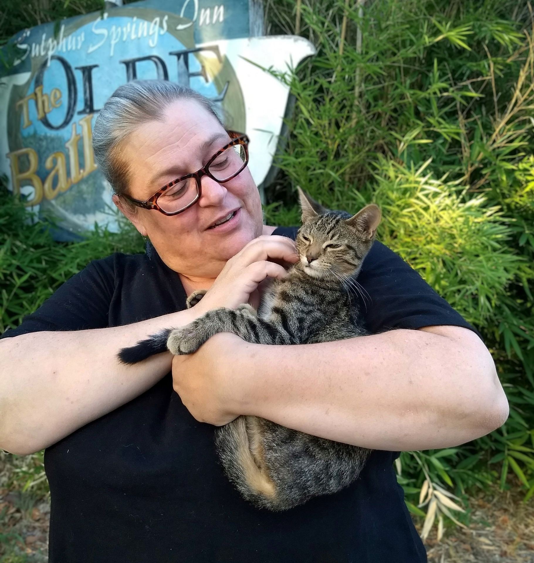 Devi Puckett, behavior consultant - holding a kitty